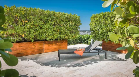 a view of a swimming pool with an outdoor space