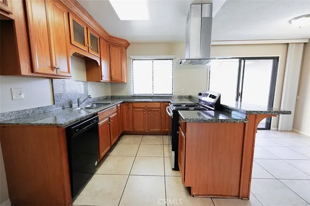 a view of a backyard of the house