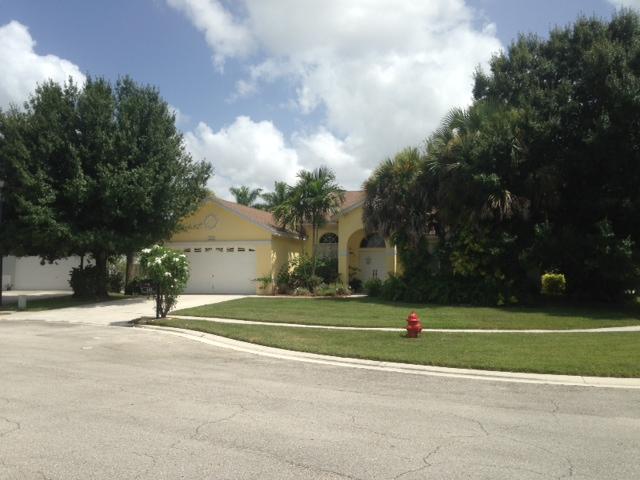 110 Nottingham Road Royal Palm Beach, FL 33411 - Photo 1 of 11 FRONT