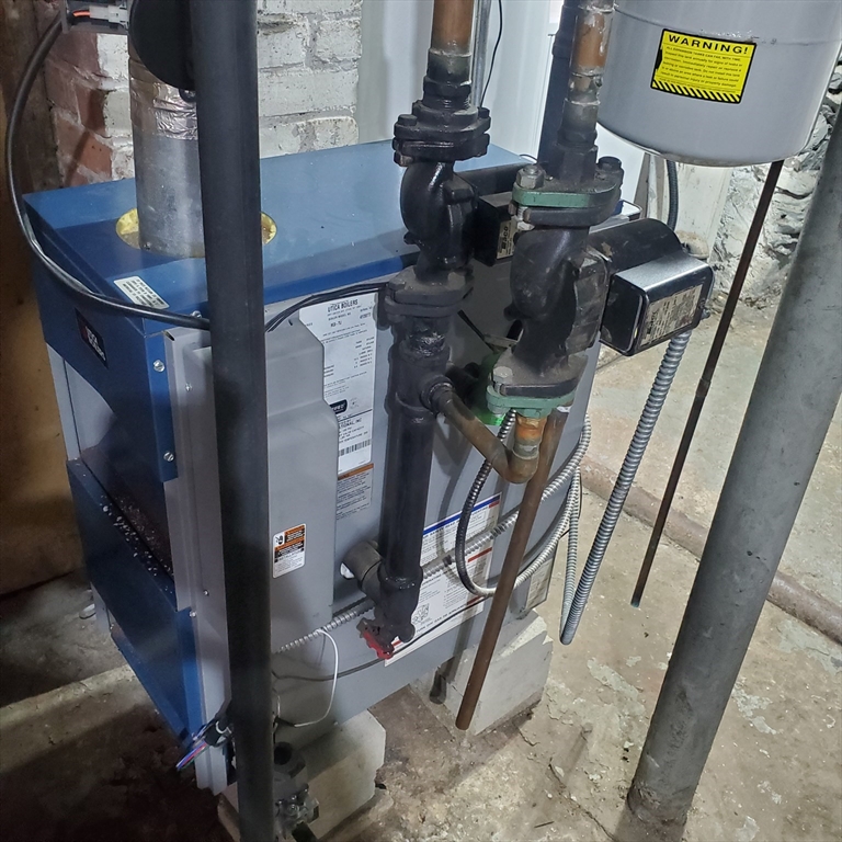 27 Halborn Street Boston, MA 02126 - Photo 14 of 20 a view of water heater room