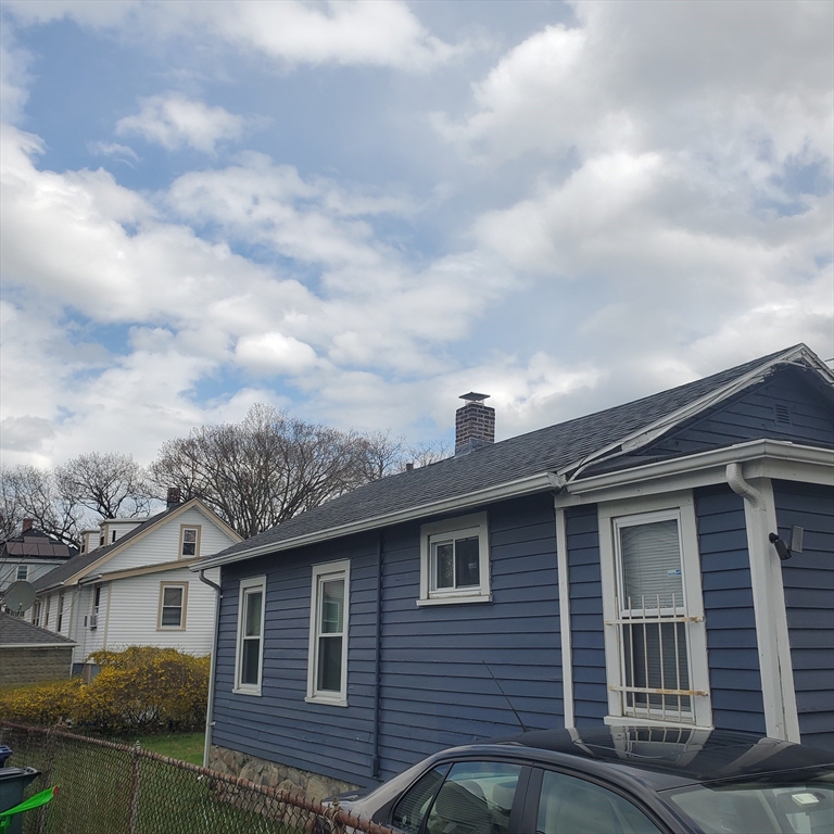 27 Halborn Street Boston, MA 02126 - Photo 17 of 20 a front view of a house with garden