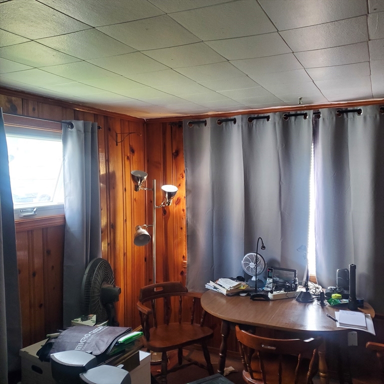 27 Halborn Street Boston, MA 02126 - Photo 2 of 20 a view of a dining room with furniture and window