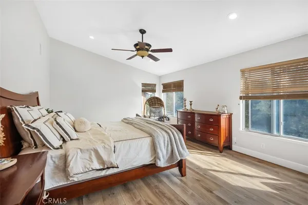 a room with furniture cabinets and window