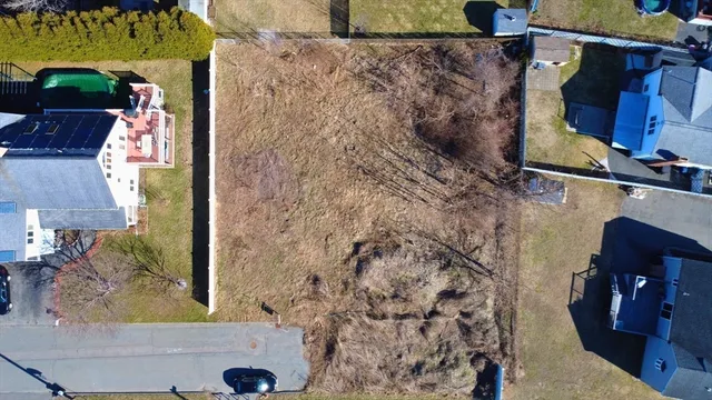 a bathroom with a shower and a mirror