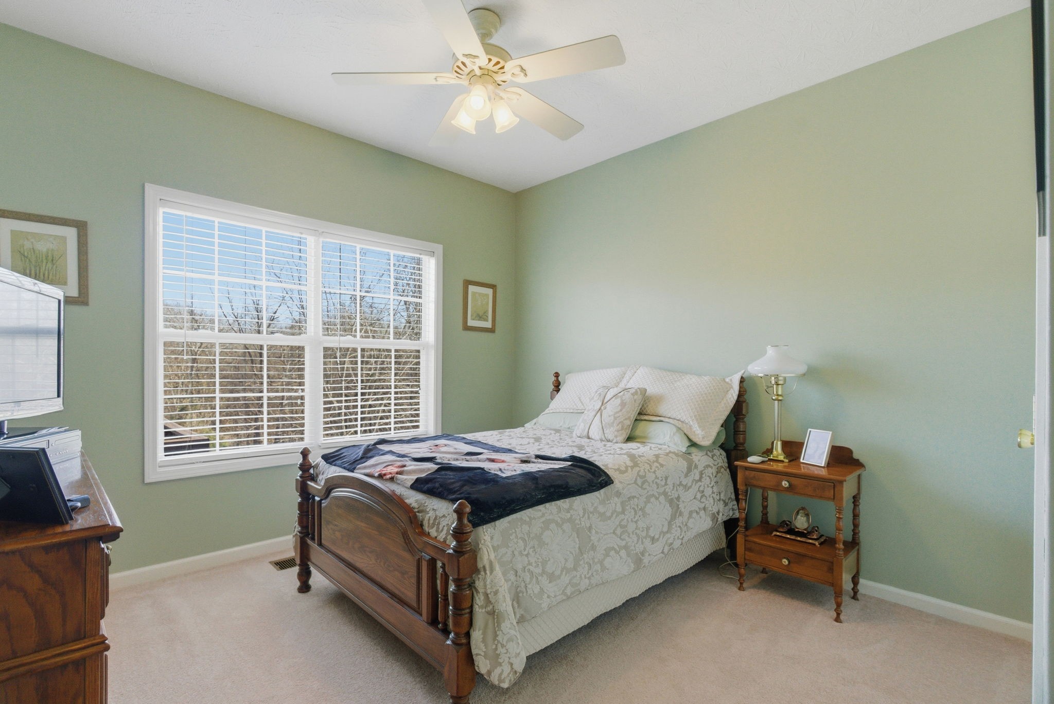 4357 Airport Road Springfield, TN 37172 - Photo 9 of 49 a bed sitting in a bedroom next to a window
