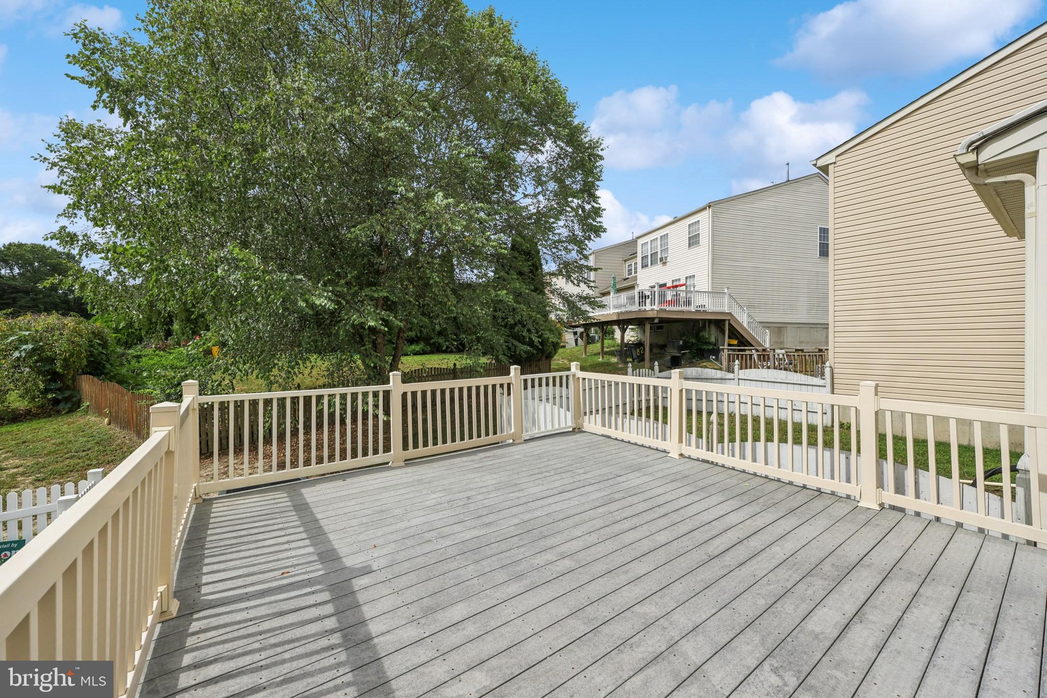 76 Millstream Road Pine Hill, NJ 08021 - Photo 21 of 30 a view of deck with wooden floor and fence