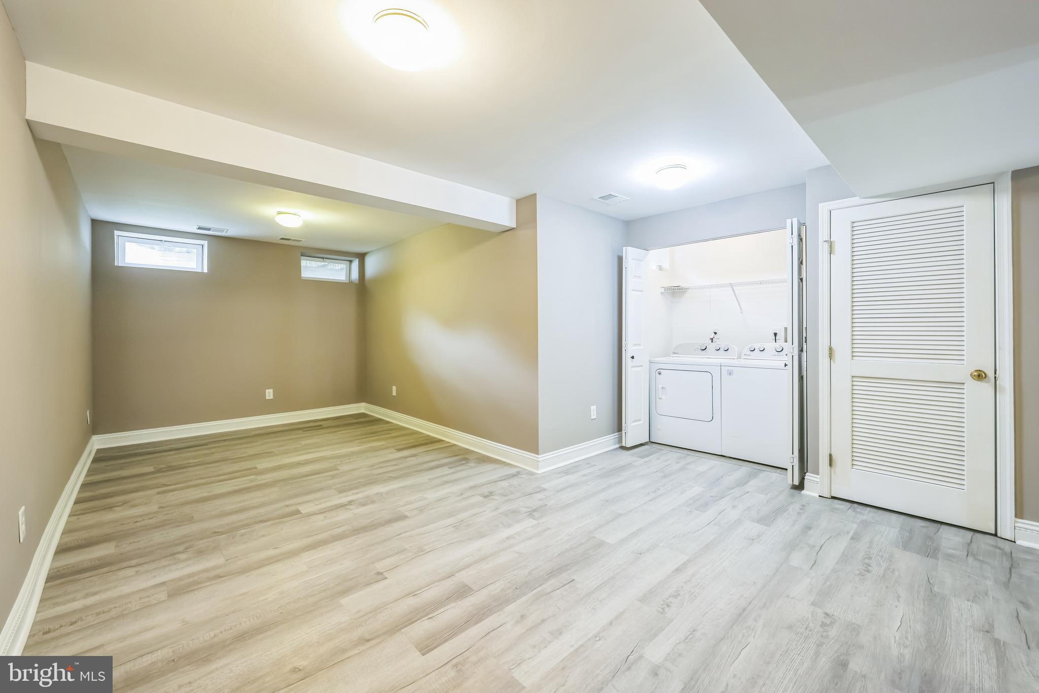 76 Millstream Road Pine Hill, NJ 08021 - Photo 4 of 30 a view of empty room with wooden floor