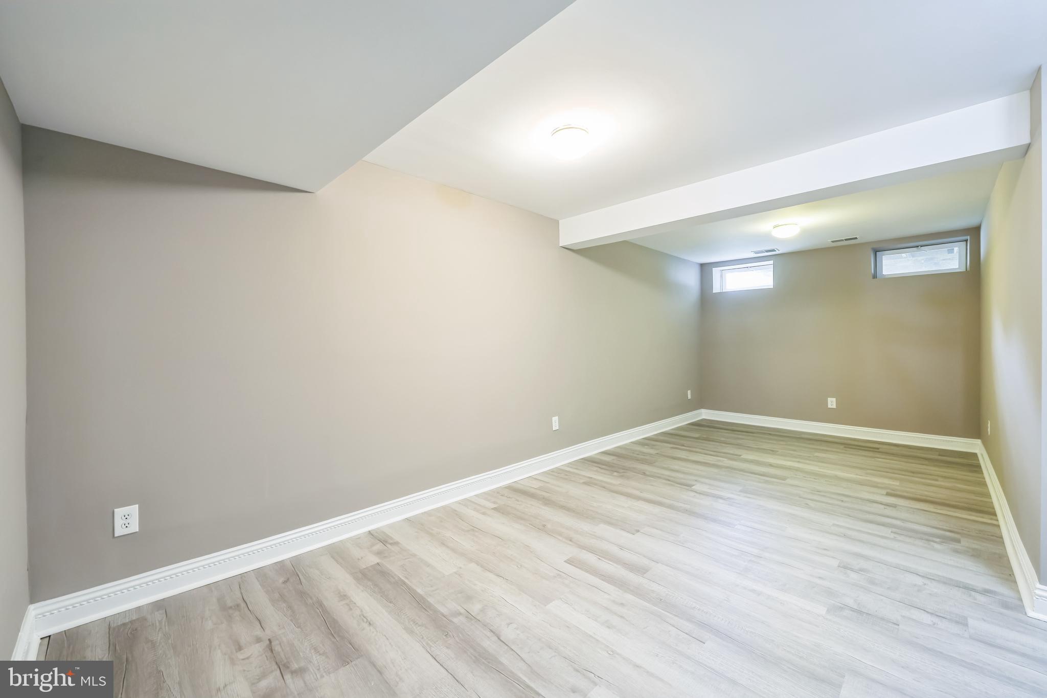 76 Millstream Road Pine Hill, NJ 08021 - Photo 6 of 30 a view of empty room with wooden floor