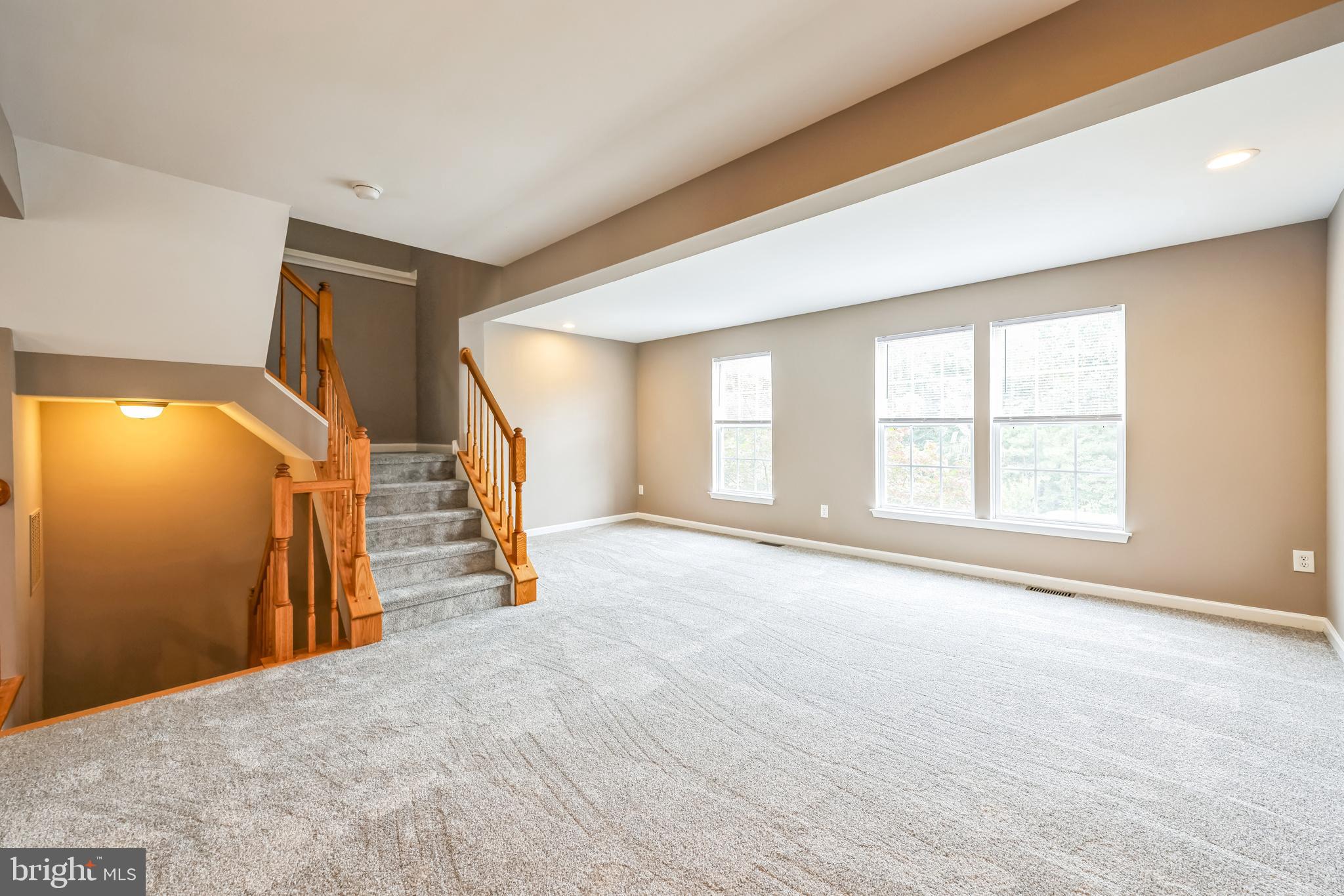 76 Millstream Road Pine Hill, NJ 08021 - Photo 8 of 30 a view of an empty room with stairs