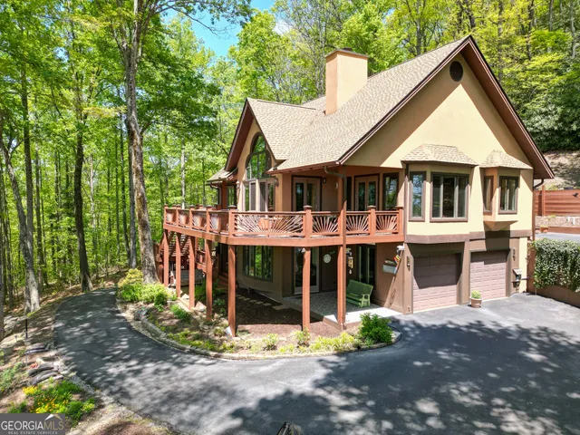 a view of a backyard of a house