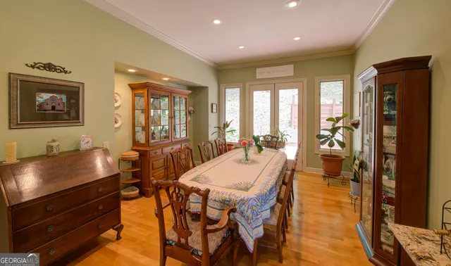 a view of balcony with wooden floor