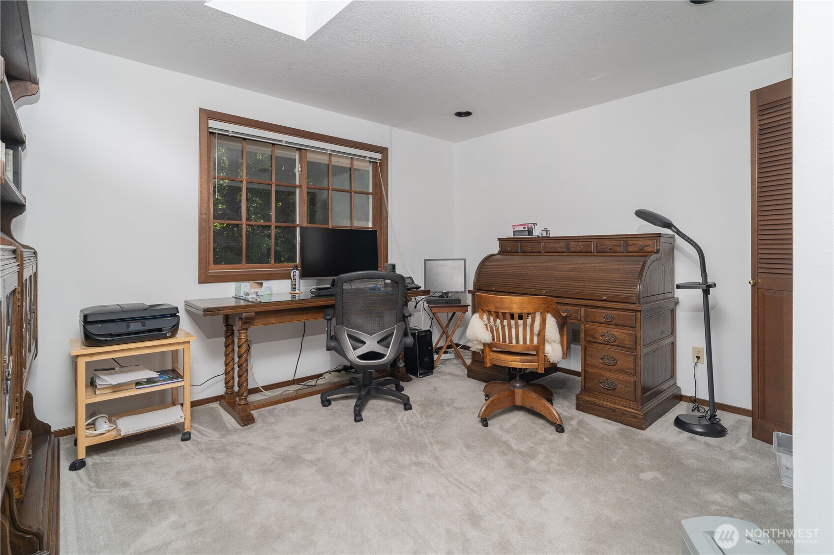 2102 Mark Street Northeast Olympia, WA 98516 - Photo 29 of 37 a view of a workspace with furniture and a window