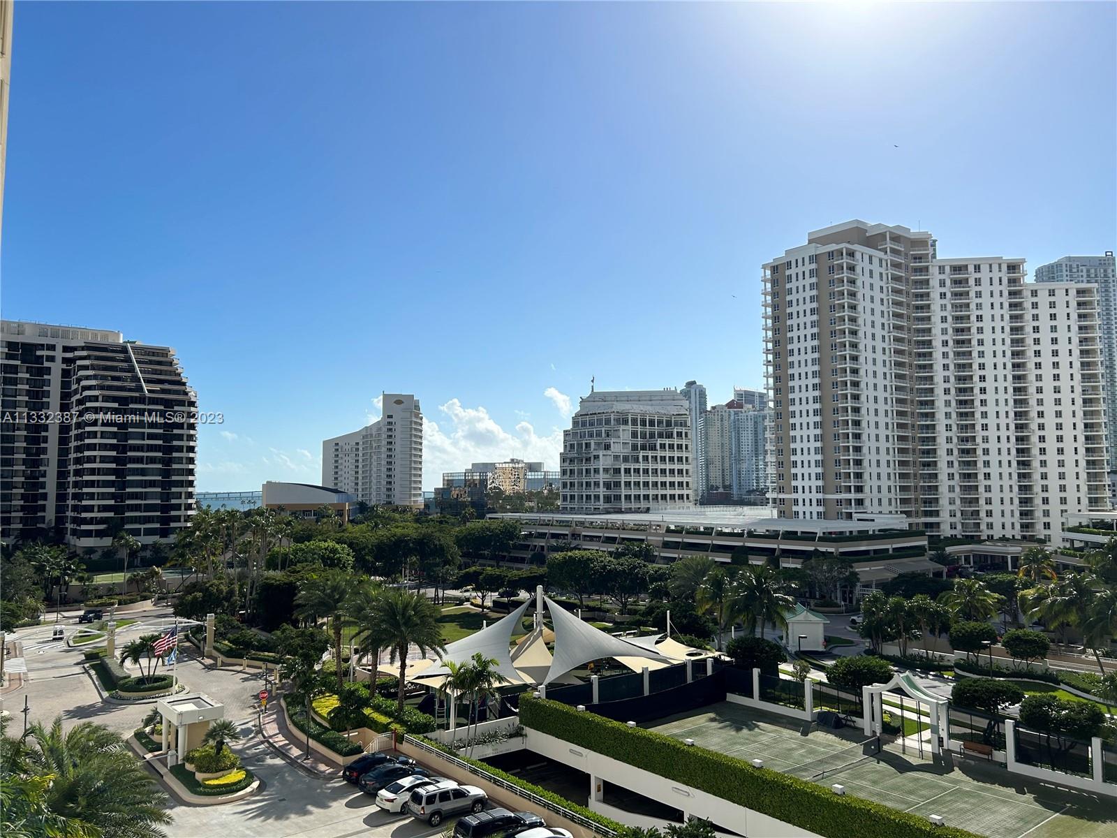 888 Brickell Key Drive, Unit 802 Miami, FL 33131 - Photo 12 of 42 a view of a city with tall buildings