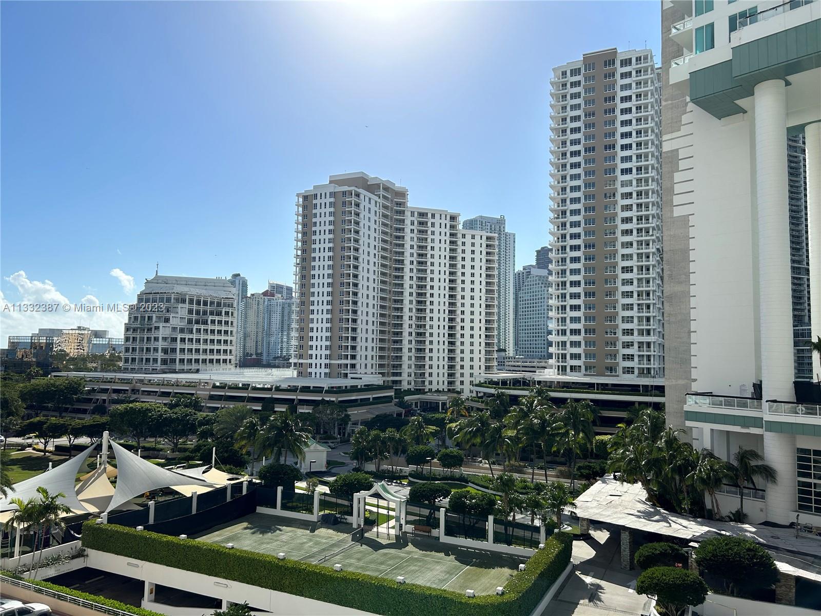888 Brickell Key Drive, Unit 802 Miami, FL 33131 - Photo 13 of 42 a view of a city with tall buildings