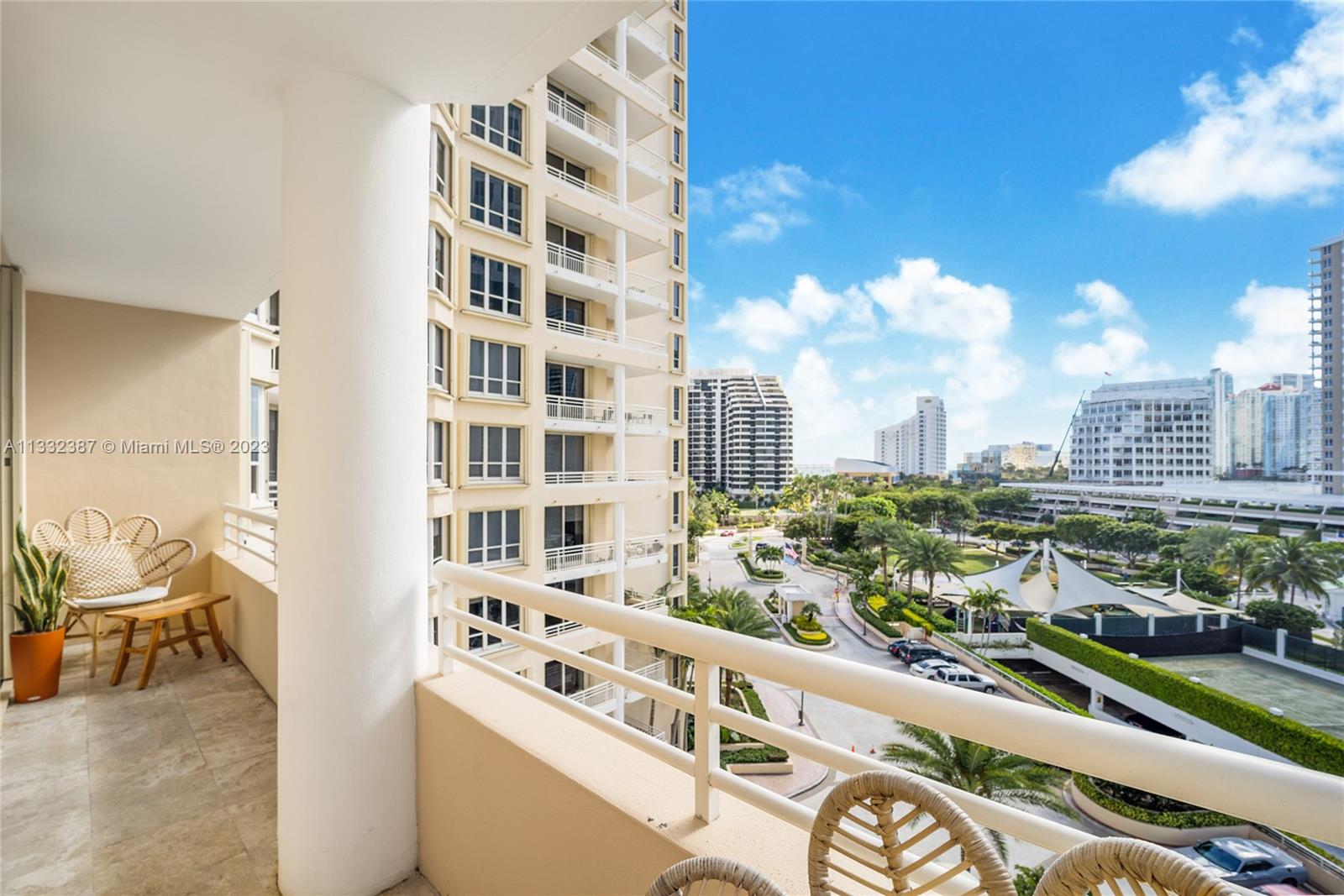 888 Brickell Key Drive, Unit 802 Miami, FL 33131 - Photo 3 of 42 a view of a city from a balcony
