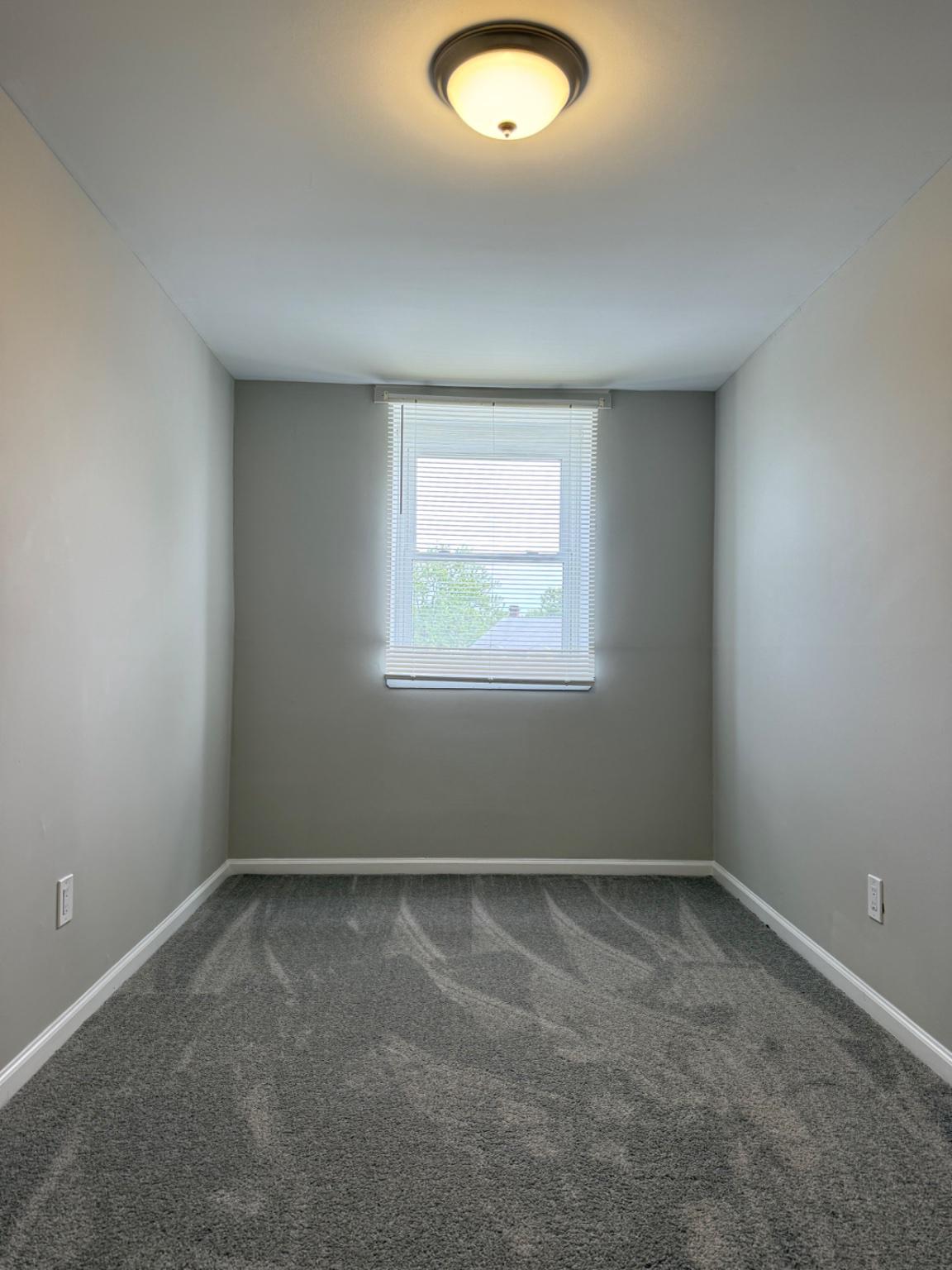2908 Mallview Road Baltimore, MD 21230 - Photo 17 of 22 an empty room with a window