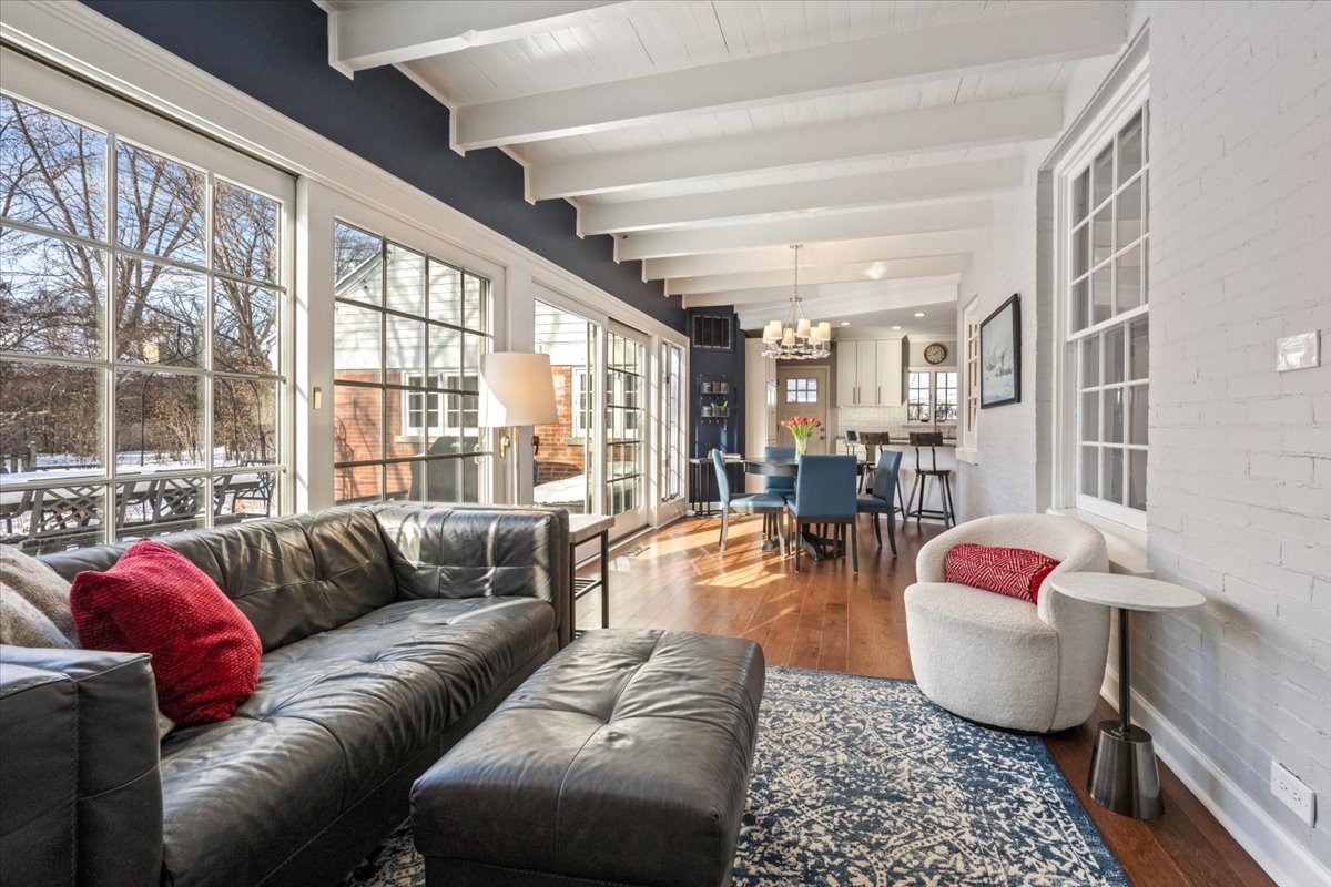 909 Locust Road Wilmette, IL 60091 - Photo 12 of 45 a living room with furniture and a large window