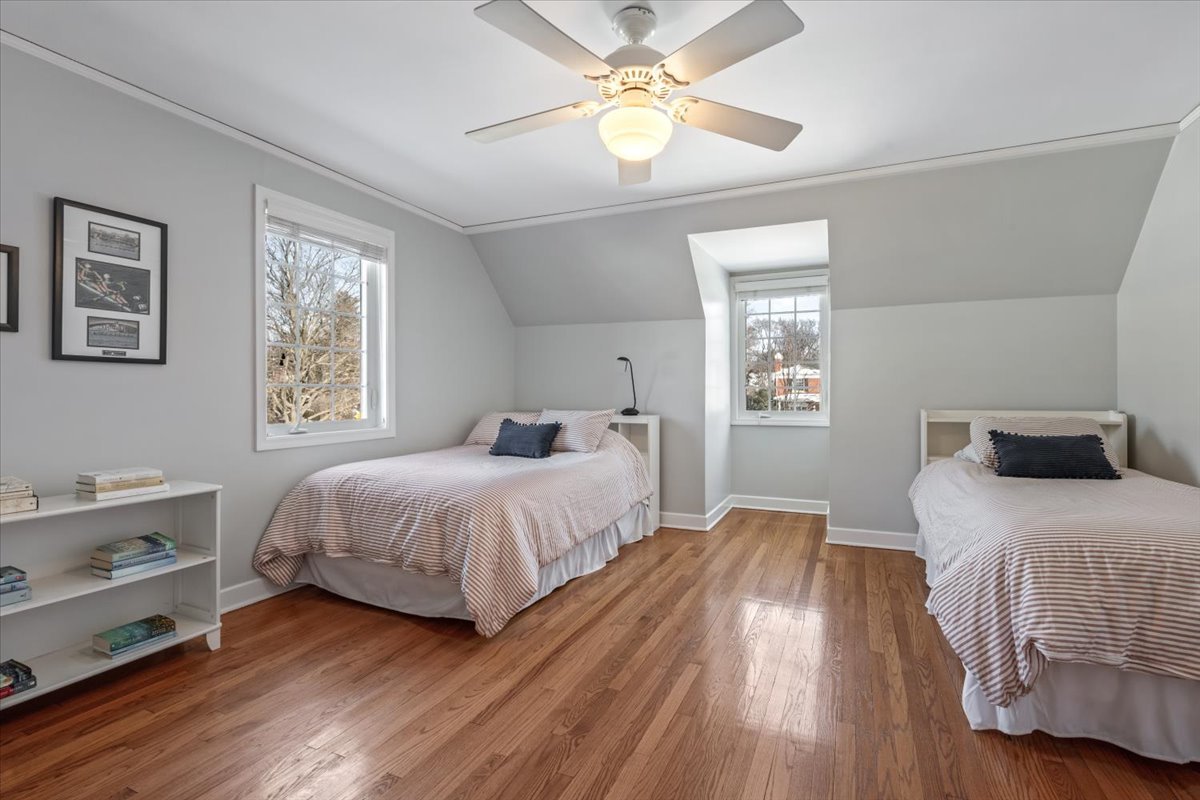 909 Locust Road Wilmette, IL 60091 - Photo 27 of 45 a bedroom with a bed and a window