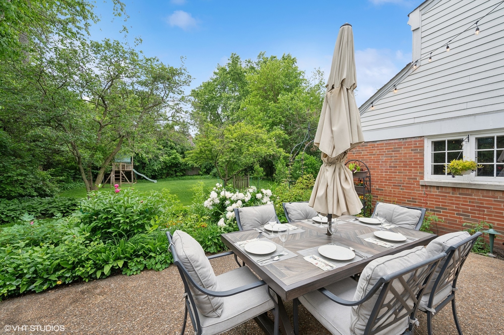 909 Locust Road Wilmette, IL 60091 - Photo 40 of 45 a view of an outdoor space with furniture and garden