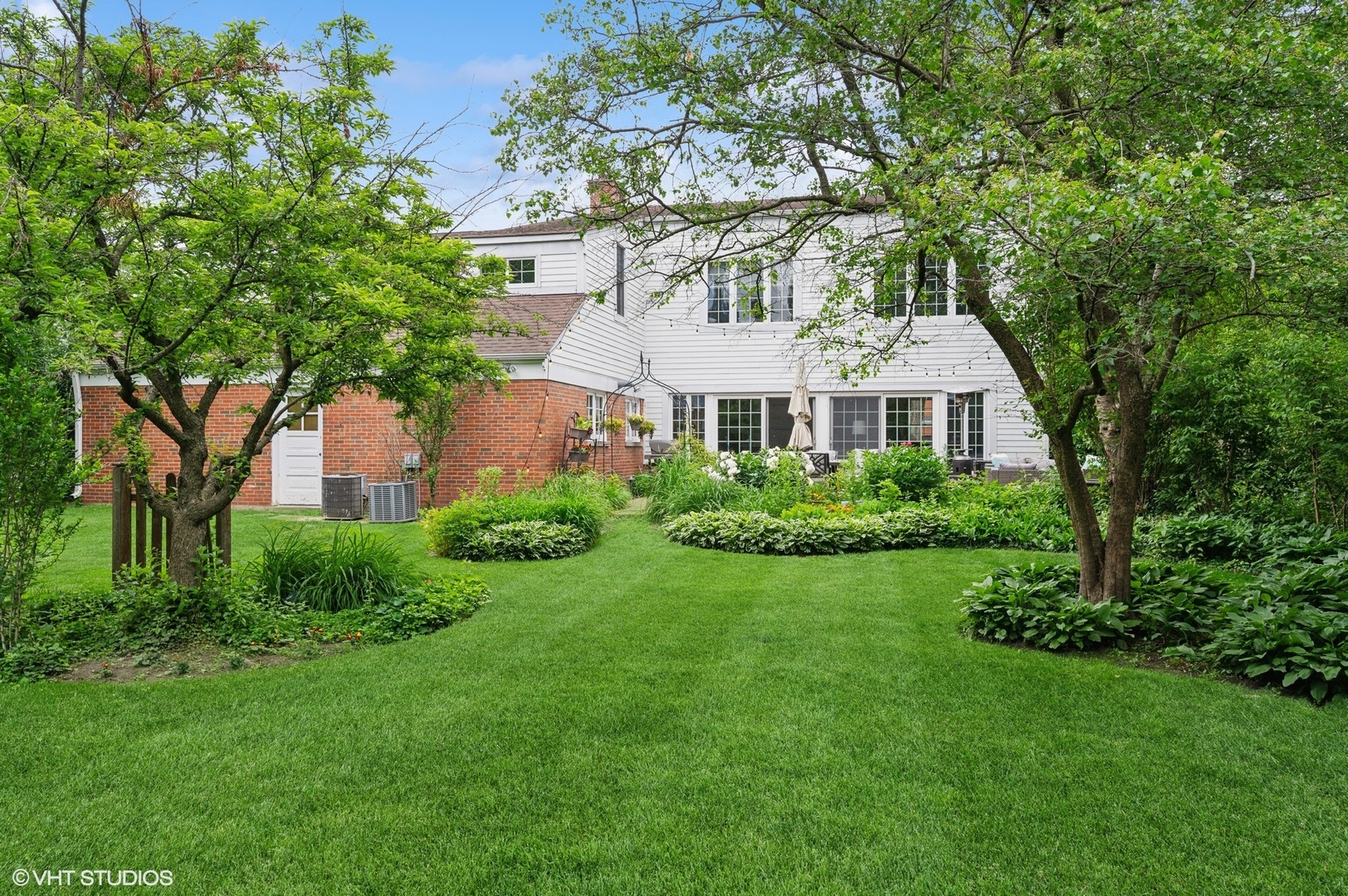 909 Locust Road Wilmette, IL 60091 - Photo 41 of 45 a front view of a house with a yard