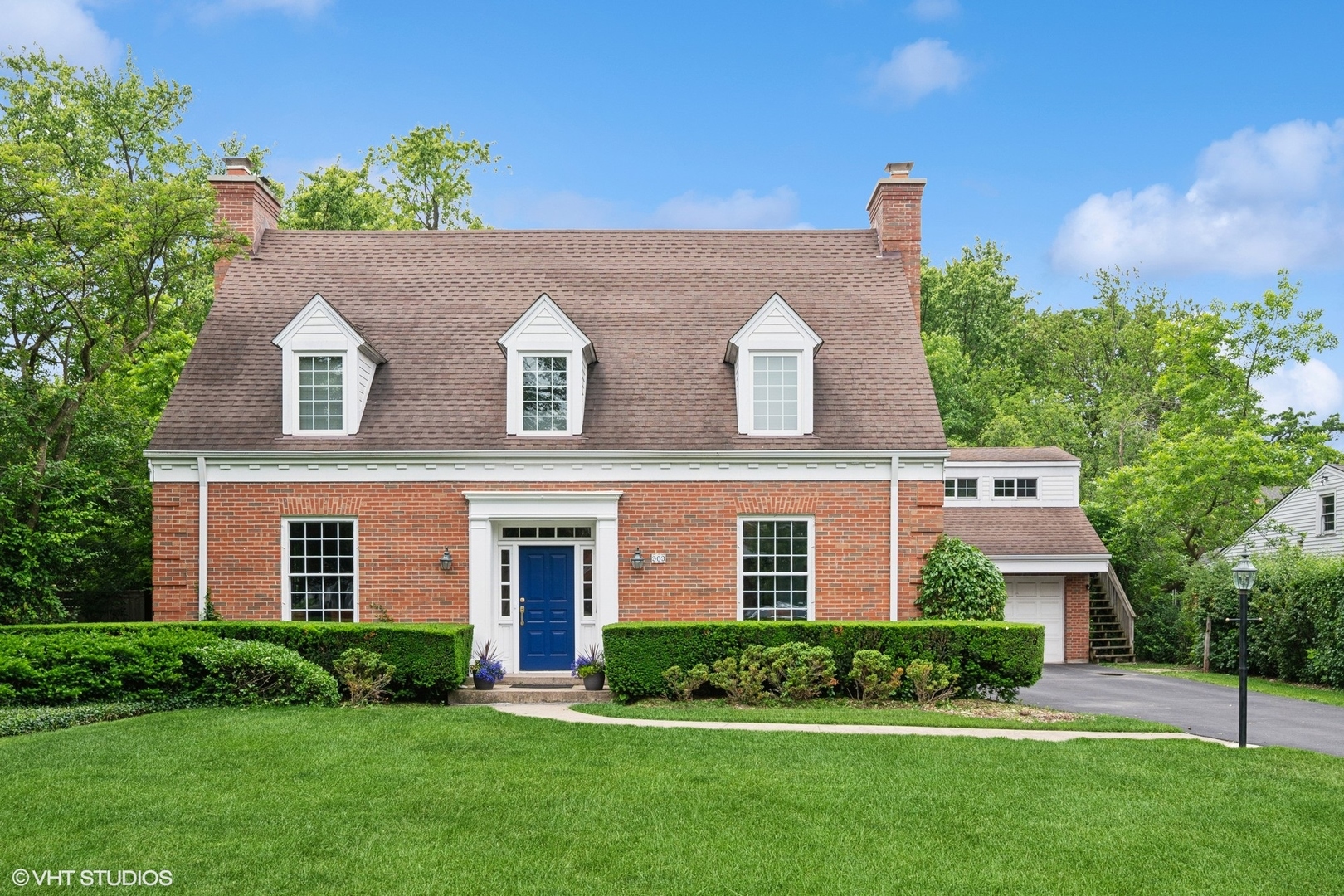 909 Locust Road Wilmette, IL 60091 - Photo 42 of 45 front view of a house with a yard