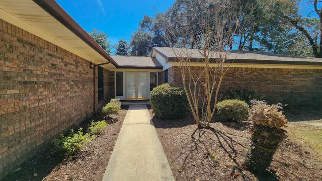 a view of a garden with pathway