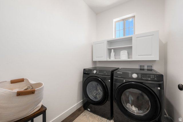 62 North Lucky 7 Road Veyo, UT 84782 - Photo 22 of 43 Laundry area featuring washer and clothes dryer, light wood-style flooring, and cabinet space