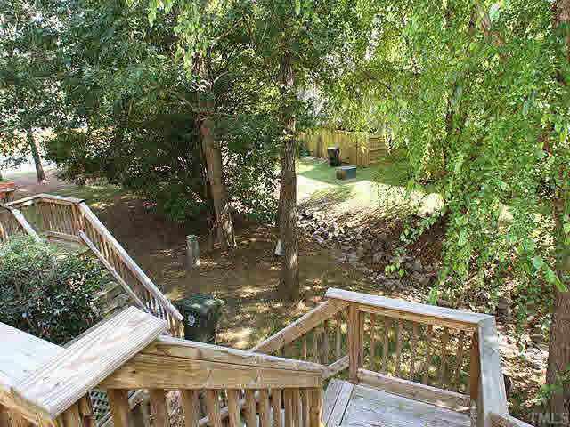 7707 Kingsberry Court Raleigh, NC 27615 - Photo 7 of 9 View from deck to wooded natural area provides nice privacy. Other