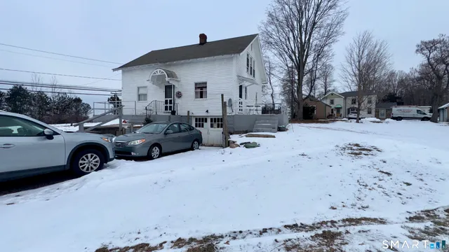 a view of a back yard of the house