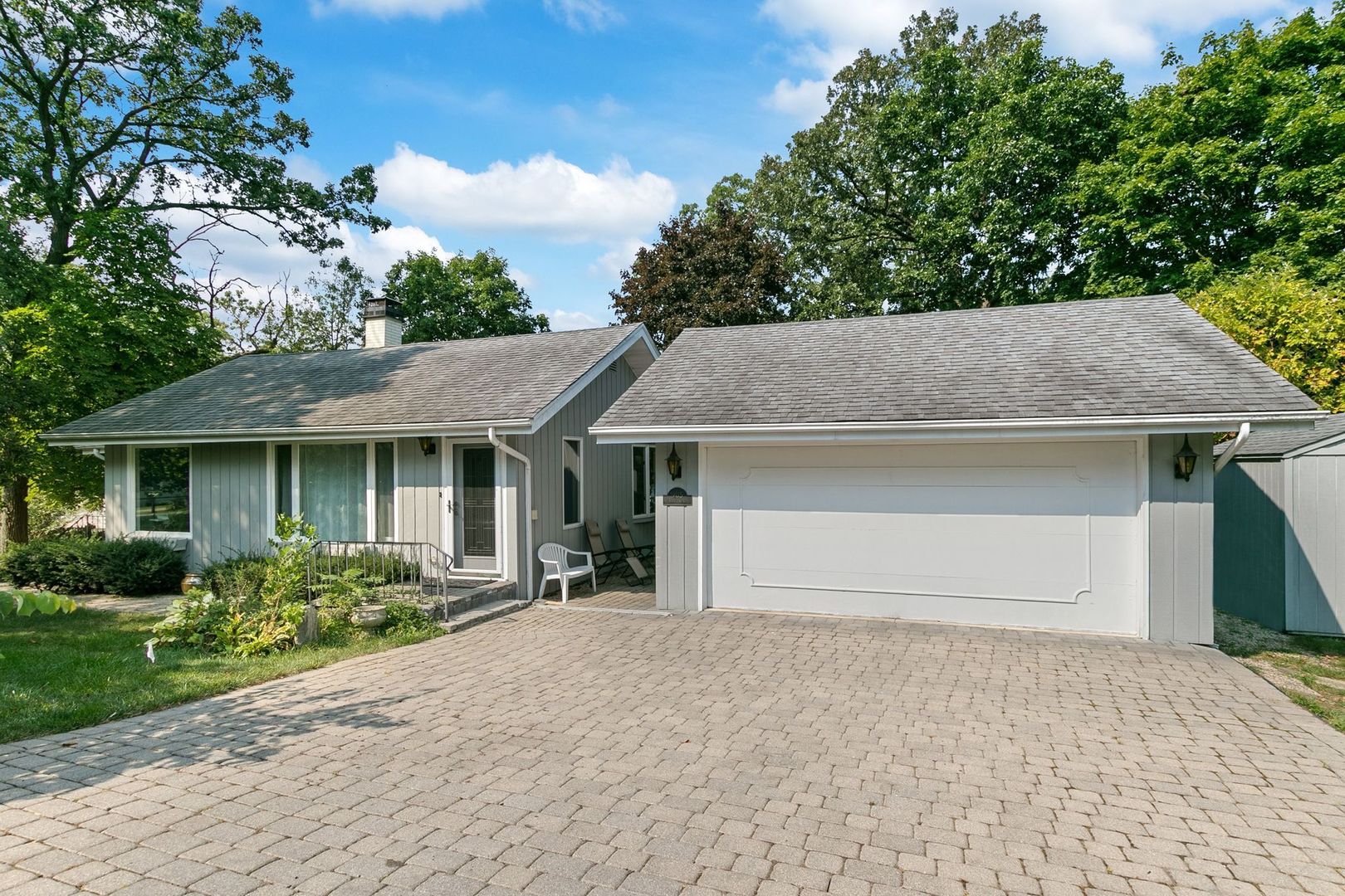 905 Ridge Avenue Wauconda, IL 60084 - Photo 2 of 27 a front view of a house with a yard and garage