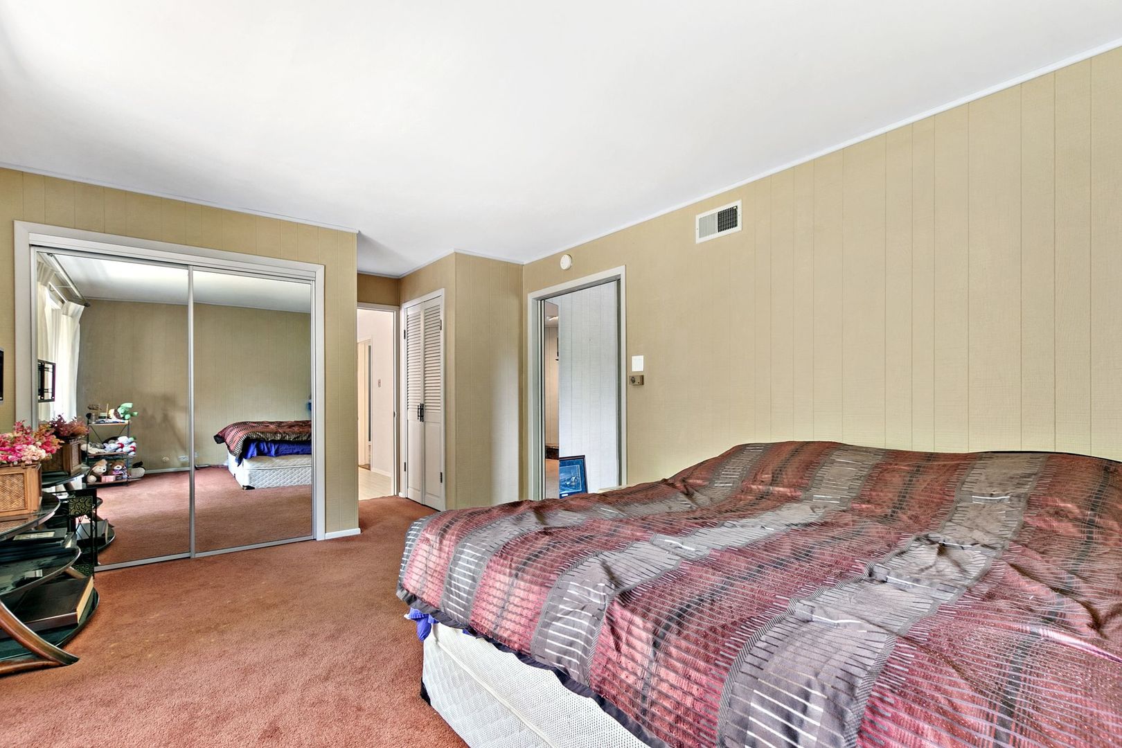 905 Ridge Avenue Wauconda, IL 60084 - Photo 15 of 27 a bedroom with a bed and glass door