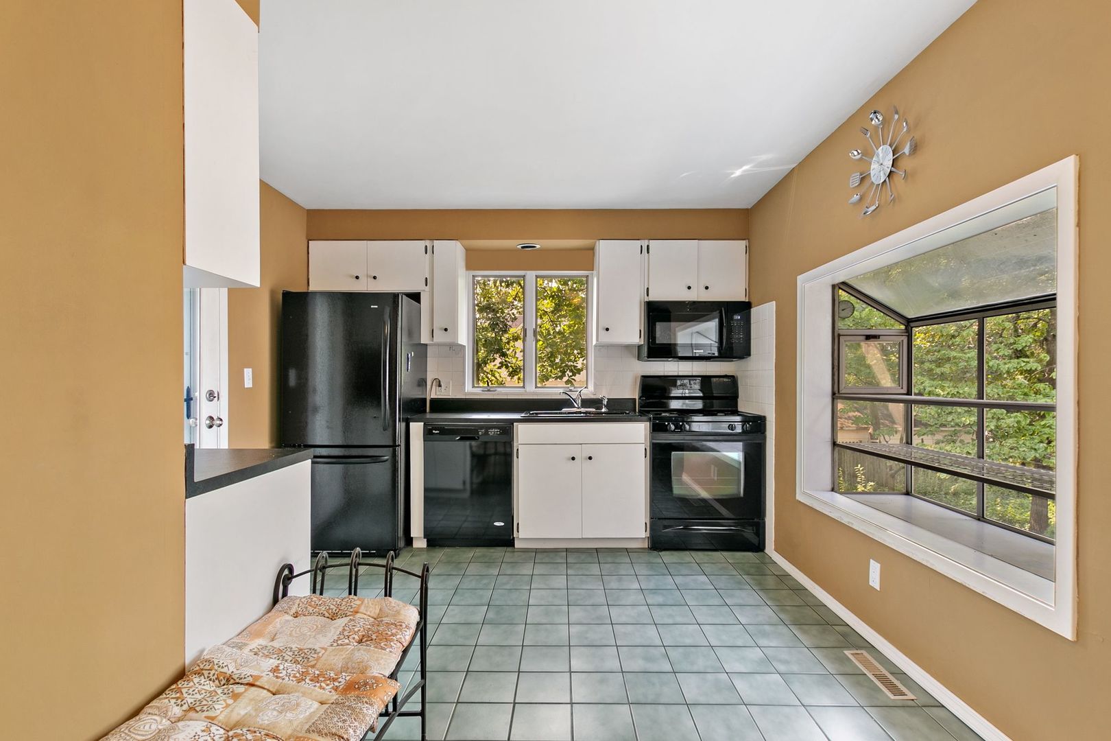 905 Ridge Avenue Wauconda, IL 60084 - Photo 16 of 27 a kitchen with stainless steel appliances granite countertop a refrigerator oven a sink dishwasher and a stove with wooden floor