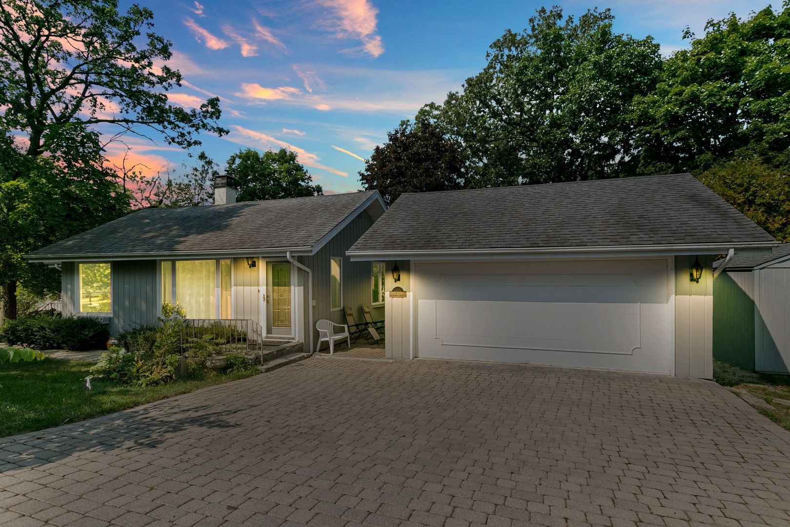 905 Ridge Avenue Wauconda, IL 60084 - Photo 4 of 27 a front view of a house with a yard and garage