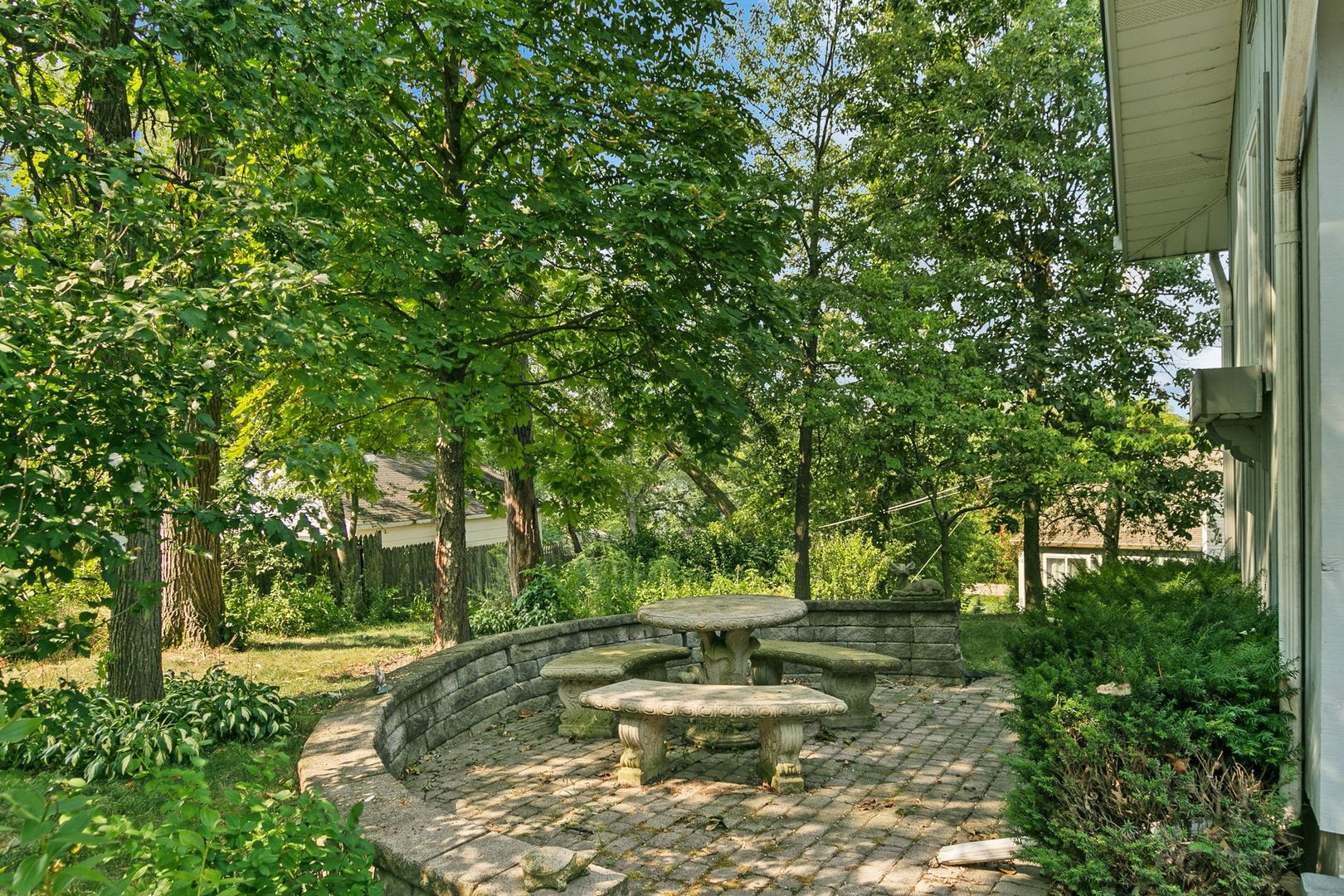 905 Ridge Avenue Wauconda, IL 60084 - Photo 7 of 27 a view of a backyard with plants and trees