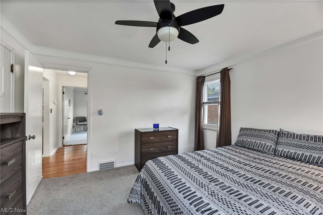 5740 Hauserman Road Parma, OH 44130 - Photo 22 of 35 Carpeted bedroom featuring ceiling fan