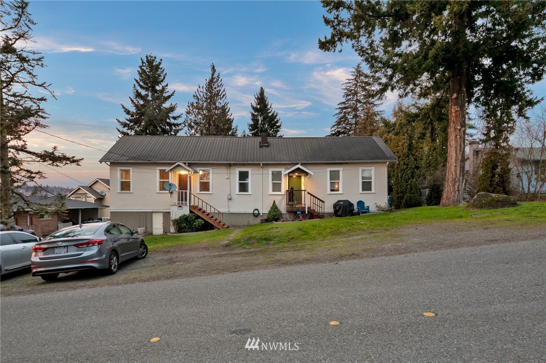 226 South 15th Street Renton, WA 98055 - Photo 20 of 28 a view of a car park in front of house