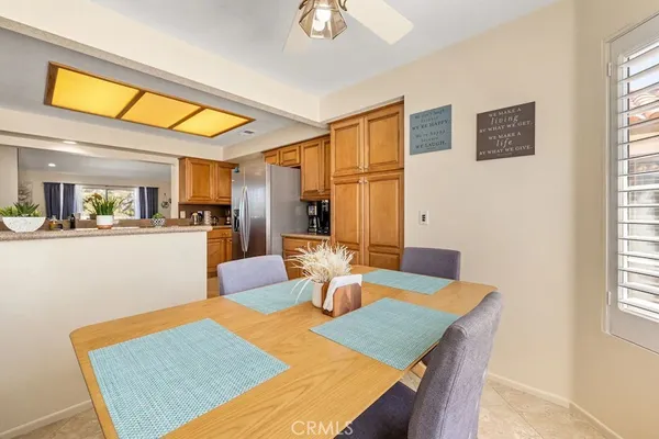 a dining room with a table and chairs in it