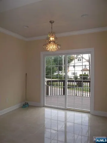 a stove top oven sitting inside of a kitchen