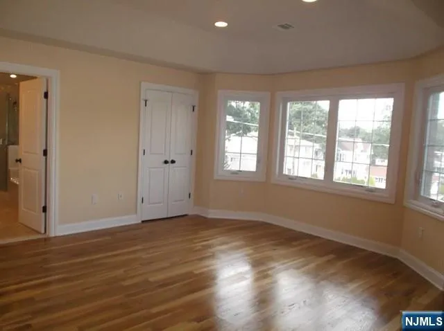 a bathroom with a sink vanity and a mirror