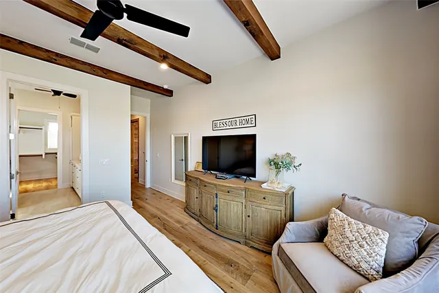 a bed room with a bed and a couch