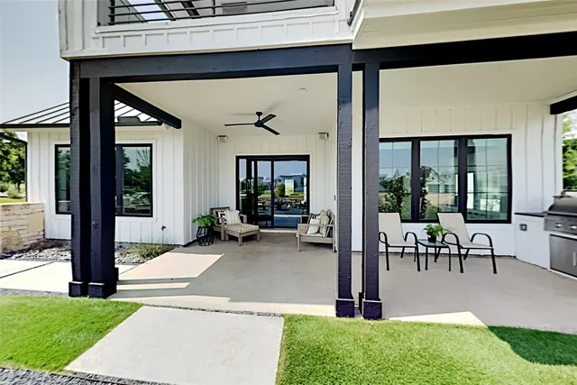 a view of a balcony with chairs