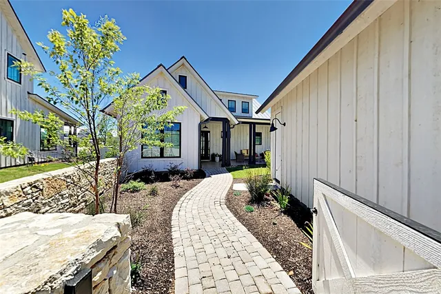 a very nice looking house with a large window