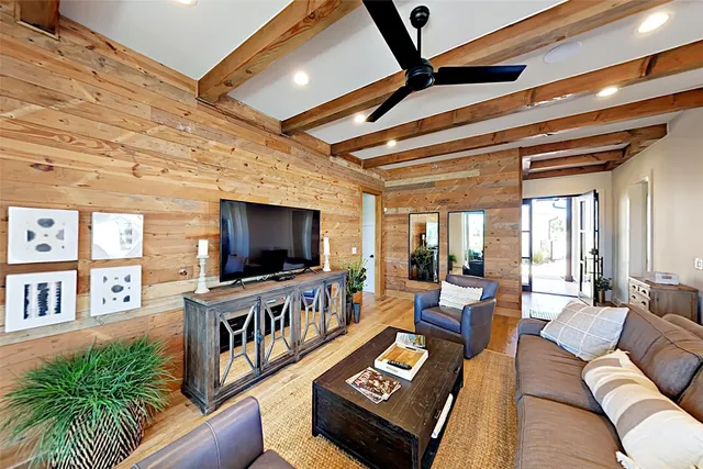 a view of a chairs and table in the balcony