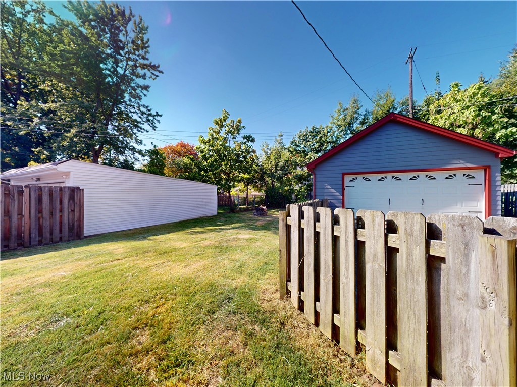 1136 Erieview Road Cleveland Heights, OH 44121 - Photo 42 of 45 View of yard with an outbuilding and a garage