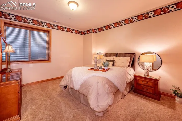 a bed room with a bed and a chandelier