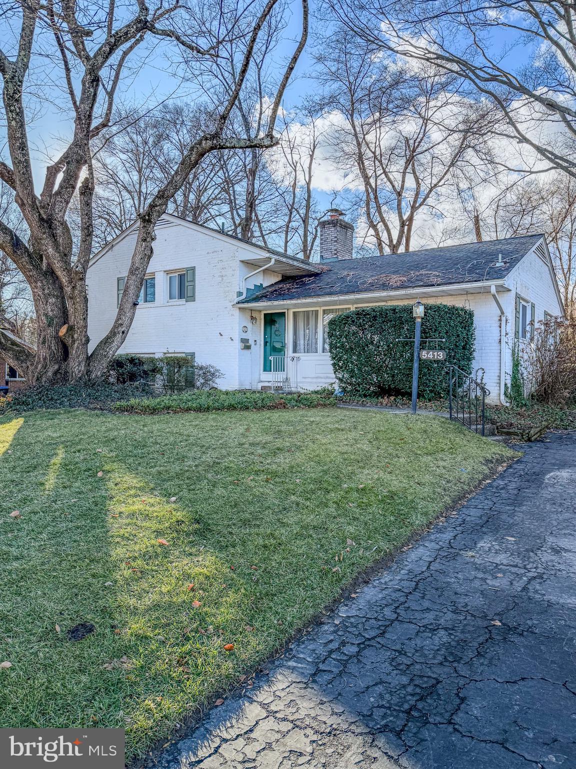 5413 Glenallen Street Springfield, VA 22151 - Photo 3 of 7 a view of a house with yard and a tree