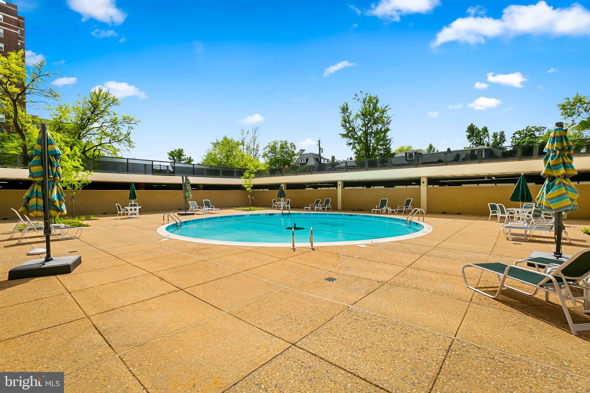 4000 North Charles Street, Unit 1605 Baltimore, MD 21218 - Photo 45 of 45 a view of swimming pool with seating space