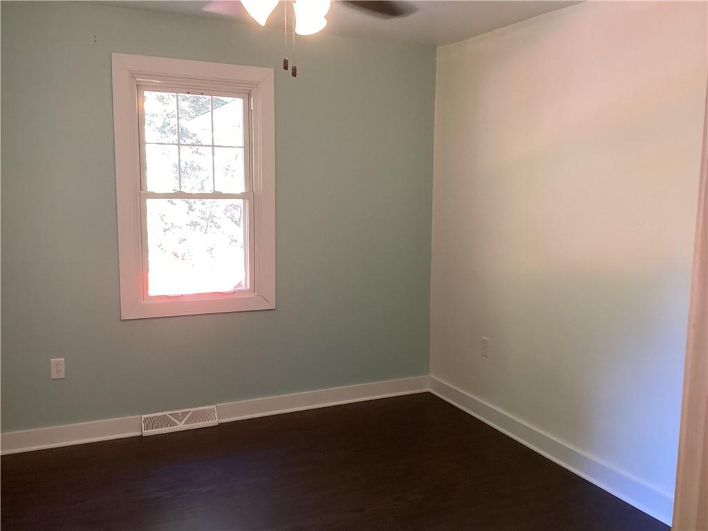 479 Crawford Run Road Creighton, PA 15030 - Photo 31 of 50 an empty room with wooden floor and windows