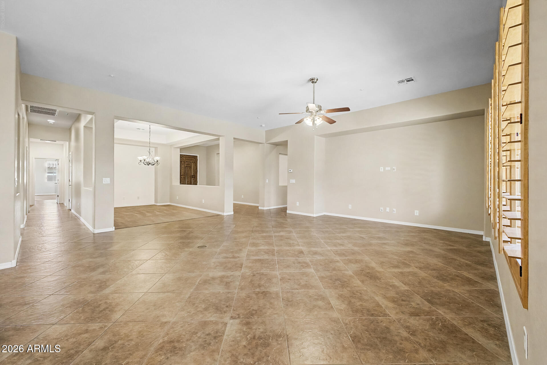 6587 South Martingale Road Gilbert, AZ 85298 - Photo 7 of 57 Family room and down hall