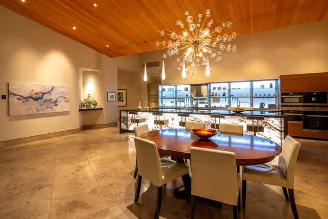 a bathroom with a double vanity sink mirror and shower